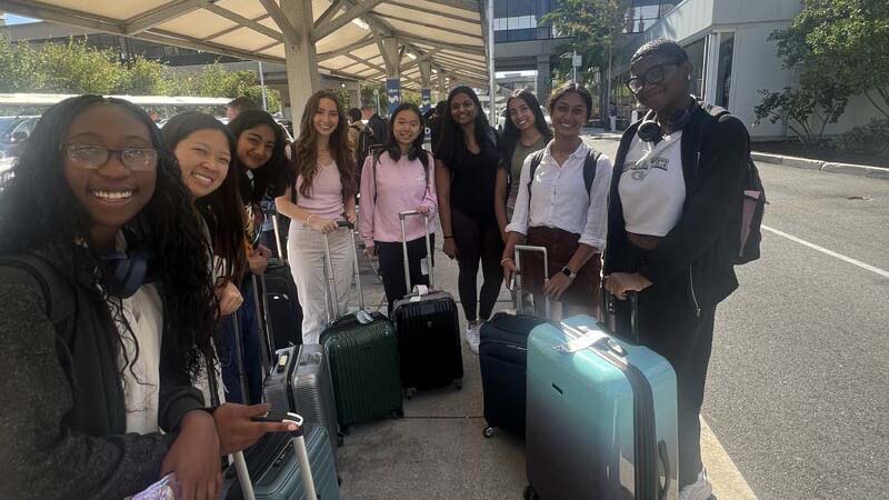 Jade Neal (left) with other students attending Grace Hopper. Photos Courtesy of the College of Computing.