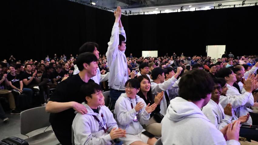 A group of cheering students