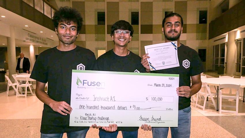 InstructAI team with prize check for winning Klaus Startup Challenge at Georgia Tech