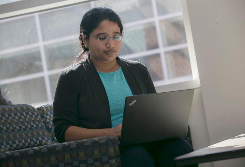 Woman working on a laptop computer