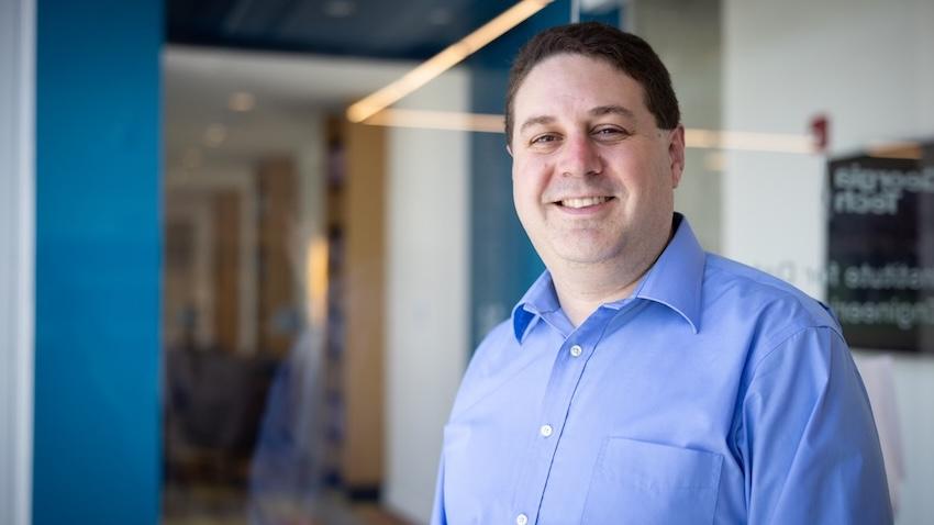 Man standing in hallway